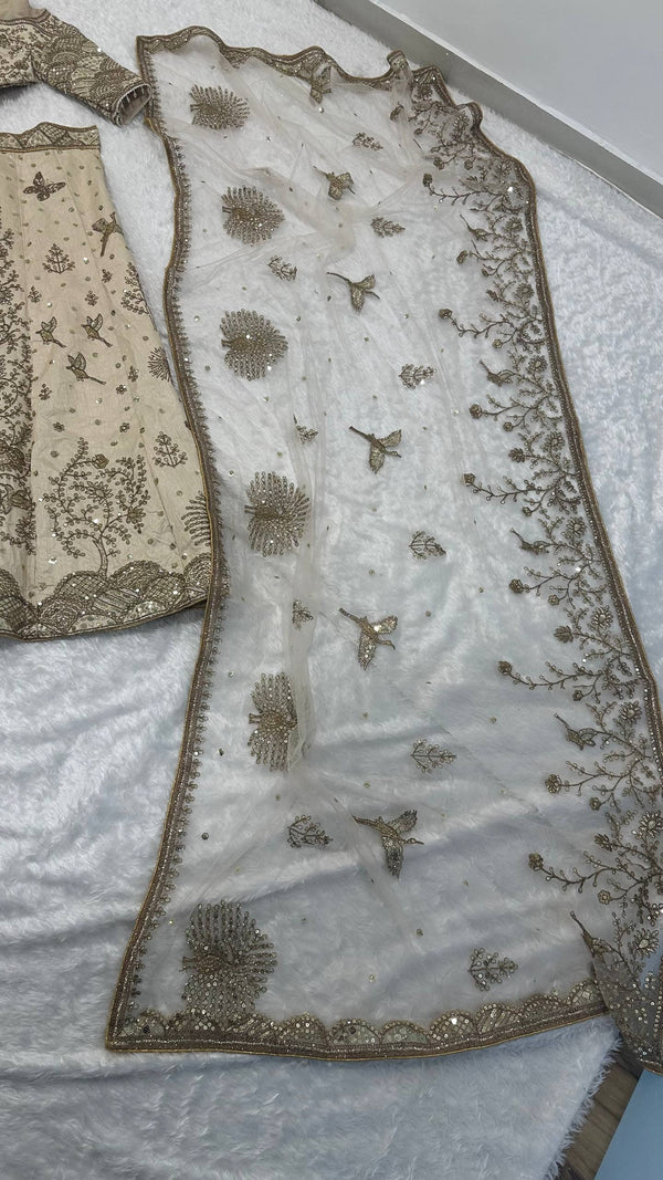 Cream Heavy Slub Silk Lehenga with Sequins, Dori & Zari Work, Matching Blouse & Net Dupatta ClothsVilla