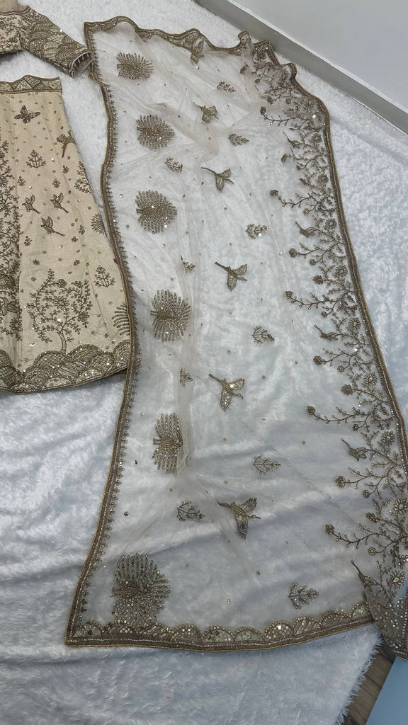 Cream Heavy Slub Silk Lehenga with Sequins, Dori & Zari Work, Matching Blouse & Net Dupatta ClothsVilla