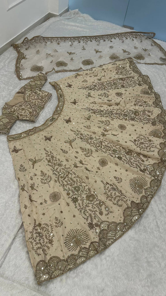 Cream Heavy Slub Silk Lehenga with Sequins, Dori & Zari Work, Matching Blouse & Net Dupatta ClothsVilla