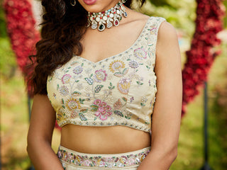 Cream Luxurious Viscose Semi-Stitched Lehenga Set with Green-Gold Embroidered Dupatta ClothsVilla