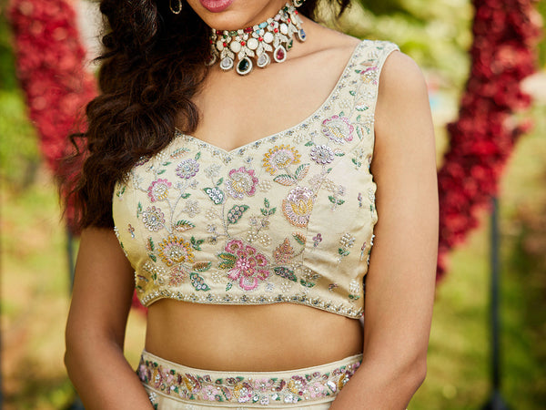 Cream Luxurious Viscose Semi-Stitched Lehenga Set with Green-Gold Embroidered Dupatta ClothsVilla
