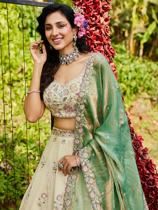 Cream Luxurious Viscose Semi-Stitched Lehenga Set with Green-Gold Embroidered Dupatta ClothsVilla