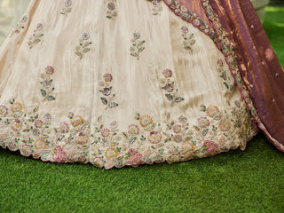 Cream Luxurious Viscose Semi-Stitched Lehenga Set with Purple-Gold Embroidered Dupatta ClothsVilla
