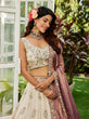 Load image into Gallery viewer, Cream Luxurious Viscose Semi-Stitched Lehenga Set with Purple-Gold Embroidered Dupatta ClothsVilla