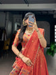 Load image into Gallery viewer, Dark Peach Shimmer Zari Weaving Lehenga ClothsVilla