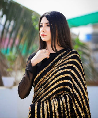 Dazzling Black & Gold Striped Sequin Saree - Weave Elegance at Weddings & Parties ClothsVilla