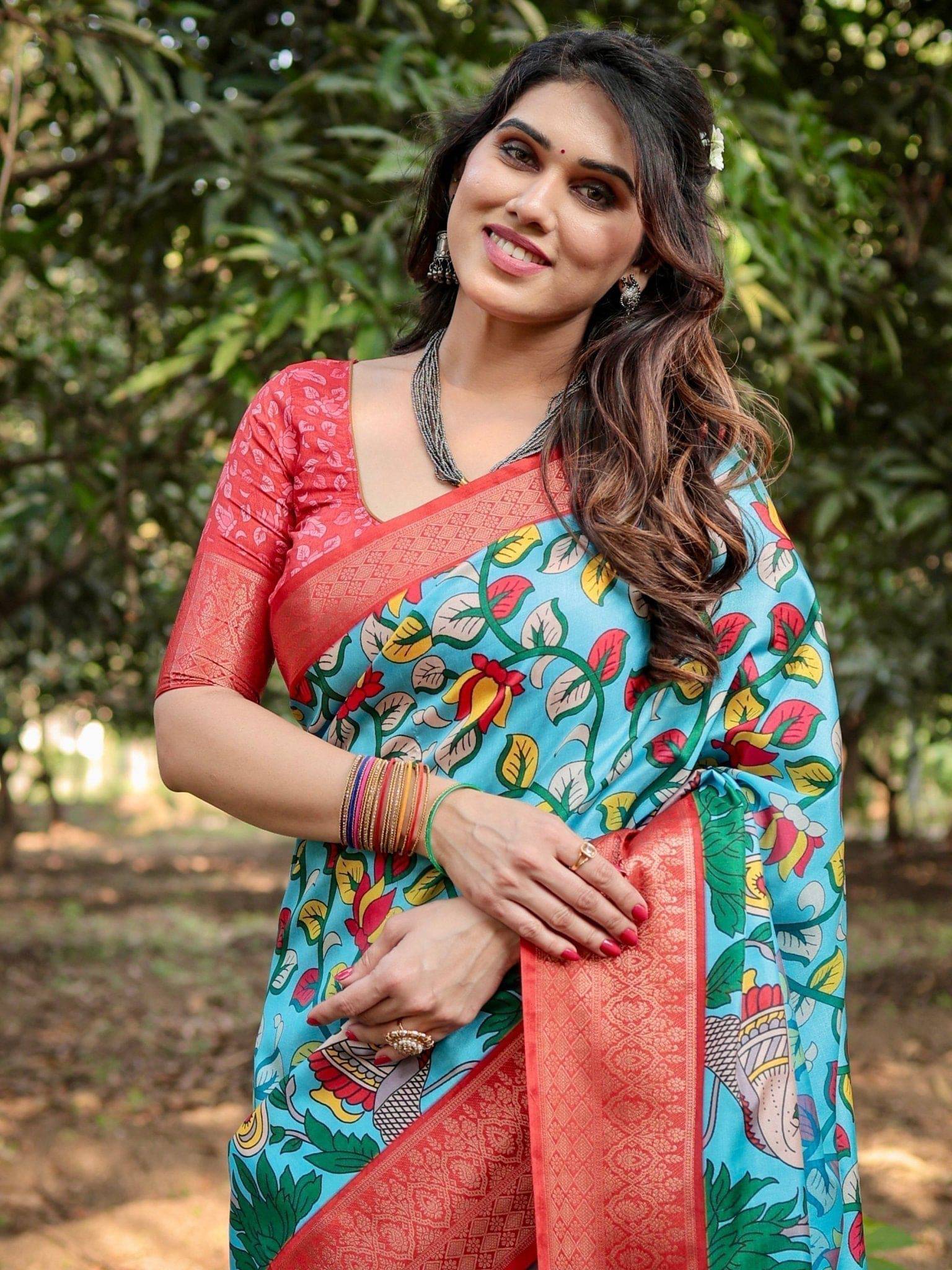 Aqua Blue Tussar Silk Saree with Vibrant Nature-Inspired Prints and Red Zari Border DIGITAL PRINT