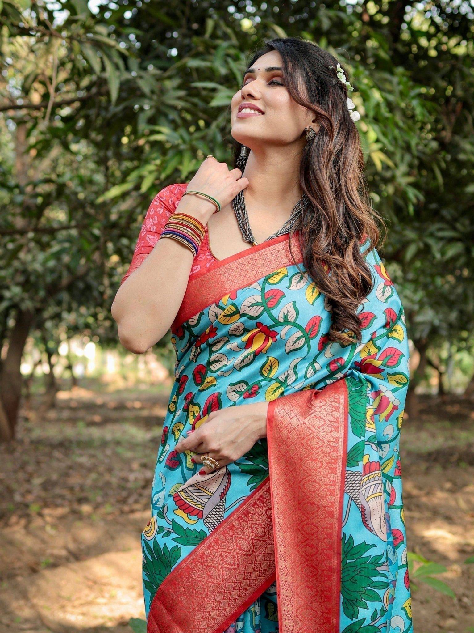 Aqua Blue Tussar Silk Saree with Vibrant Nature-Inspired Prints and Red Zari Border DIGITAL PRINT