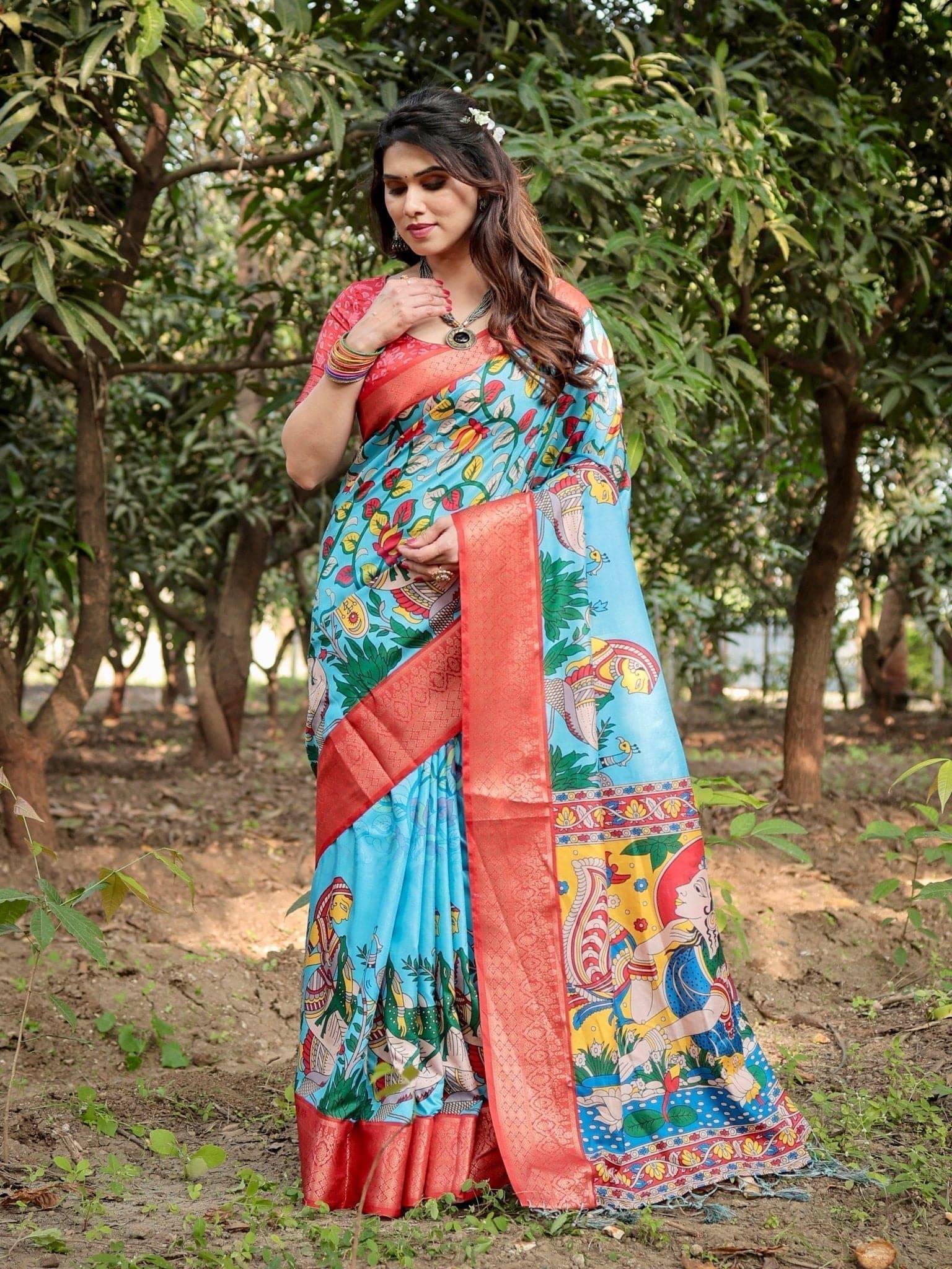 Aqua Blue Tussar Silk Saree with Vibrant Nature-Inspired Prints and Red Zari Border DIGITAL PRINT
