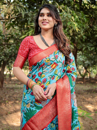 Aqua Blue Tussar Silk Saree with Vibrant Nature-Inspired Prints and Red Zari Border DIGITAL PRINT