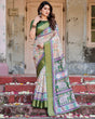 Load image into Gallery viewer, Ivory and Green Tussar Silk Saree with Elephant Motifs and Intricate Zari Border DIGITAL PRINT