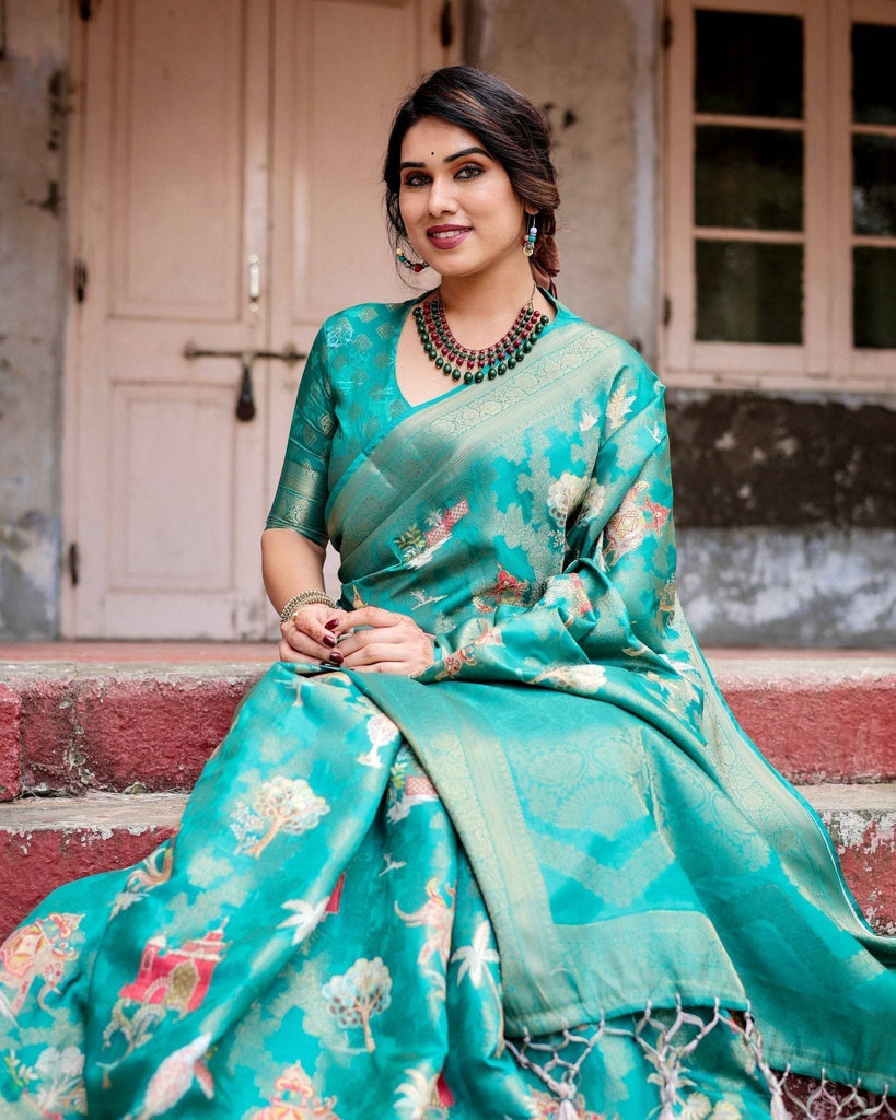 Elegant Teal Green Banarasi Silk Saree with Intricate Zari Weaving and Tassels BANARASI PRINTED