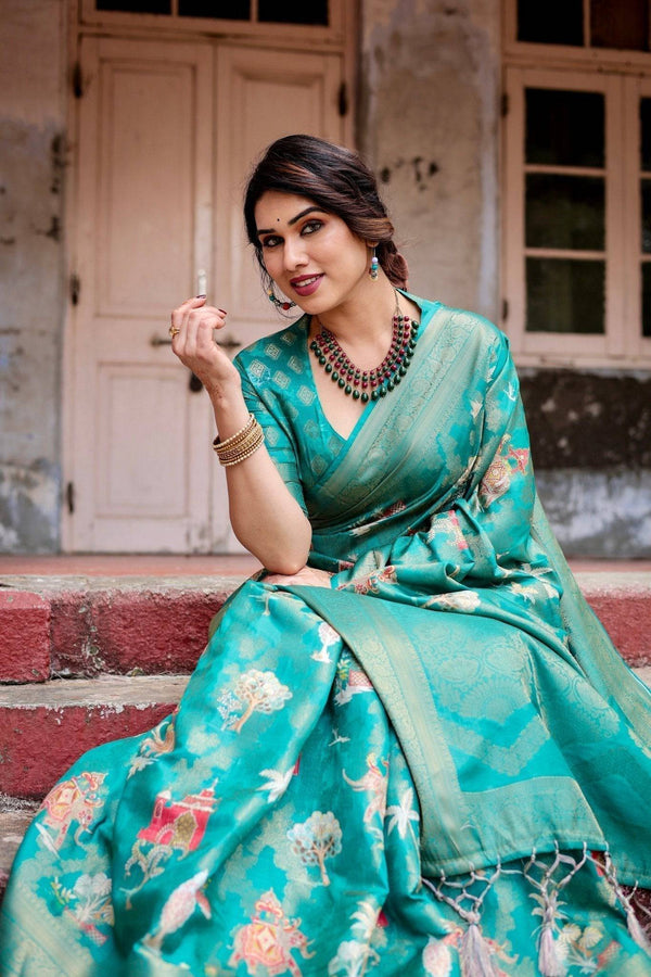 Elegant Teal Green Banarasi Silk Saree with Intricate Zari Weaving and Tassels BANARASI PRINTED
