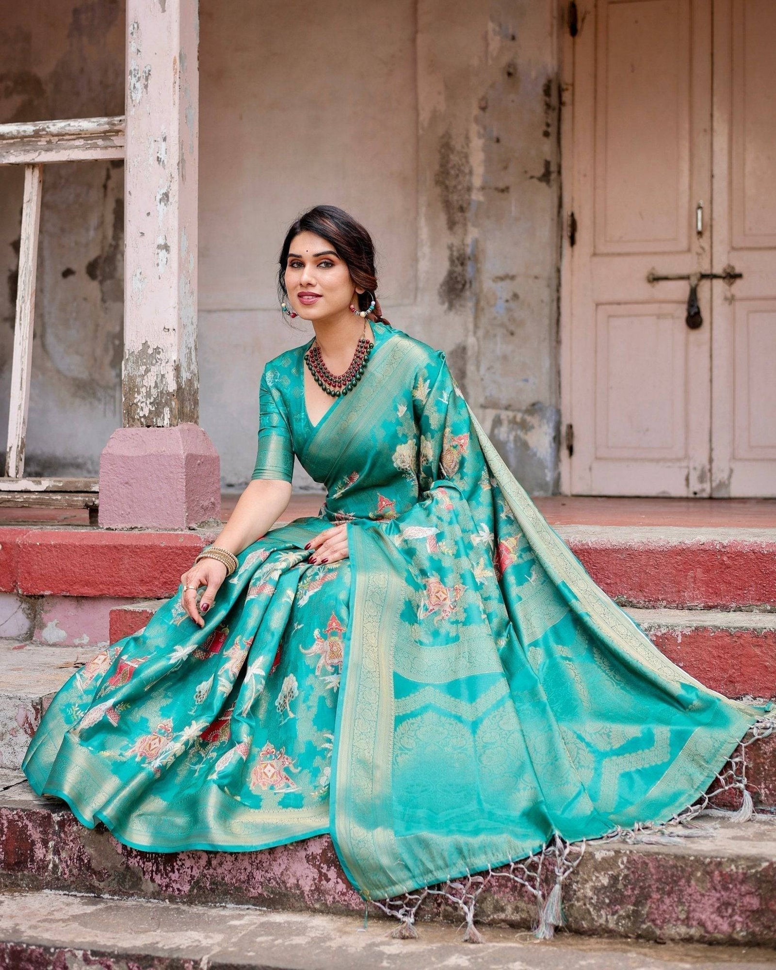 Elegant Teal Green Banarasi Silk Saree with Intricate Zari Weaving and Tassels BANARASI PRINTED