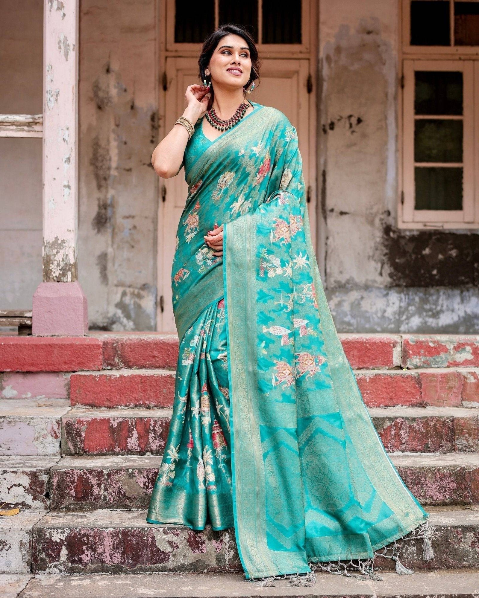 Elegant Teal Green Banarasi Silk Saree with Intricate Zari Weaving and Tassels BANARASI PRINTED