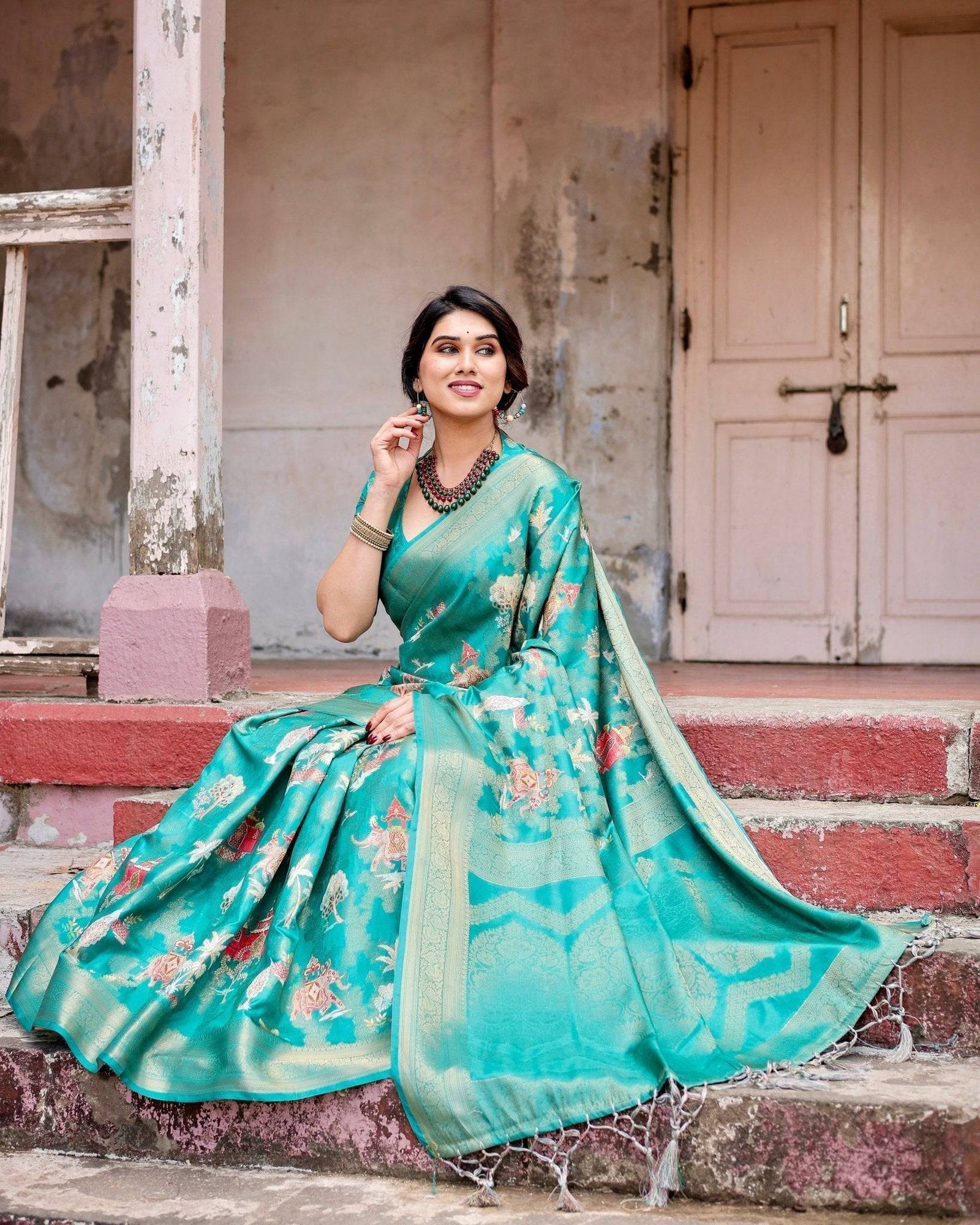 Elegant Teal Green Banarasi Silk Saree with Intricate Zari Weaving and Tassels BANARASI PRINTED