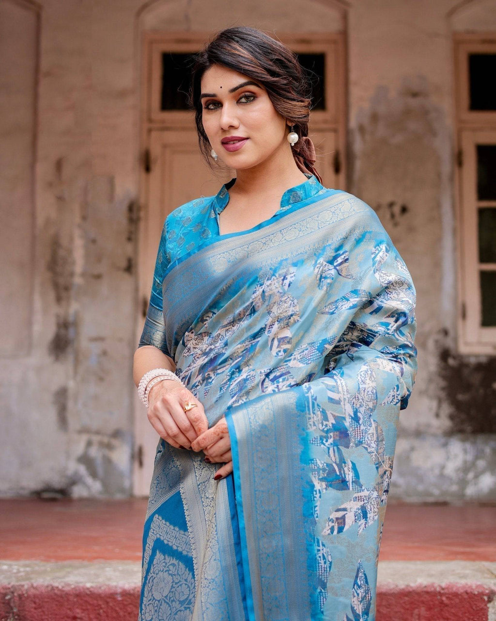 Aqua Blue Banarasi Silk Saree with Zari Border, Floral Motifs, and Tassels BANARASI PRINTED