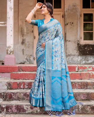 Aqua Blue Banarasi Silk Saree with Zari Border, Floral Motifs, and Tassels BANARASI PRINTED