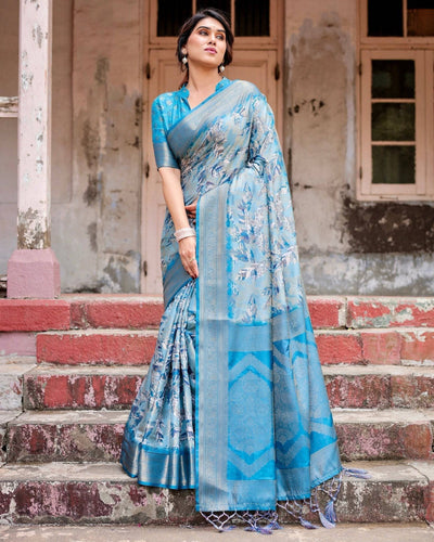 Aqua Blue Banarasi Silk Saree with Zari Border, Floral Motifs, and Tassels BANARASI PRINTED