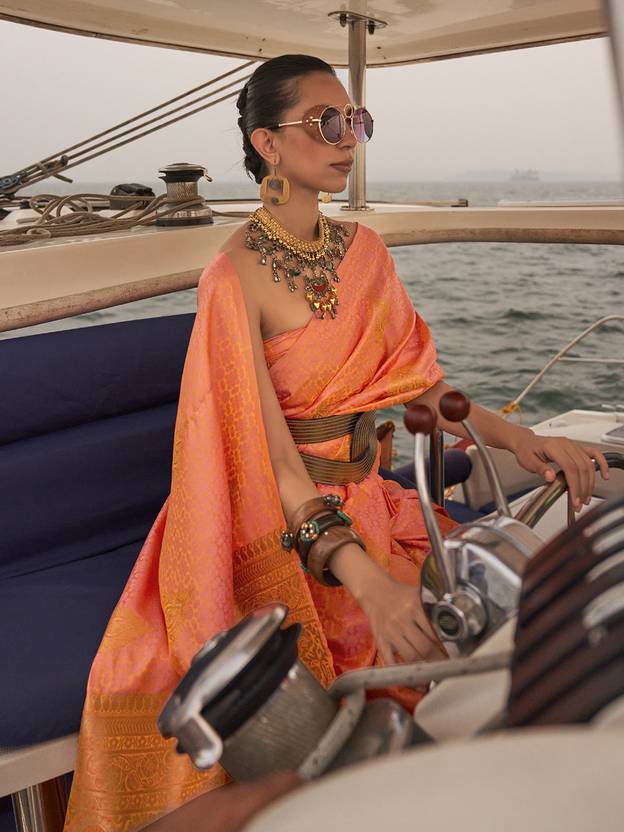 Dusty Orange Graceful Silk Blend Kanjivaram Saree with Tassel Detailing ClothsVilla