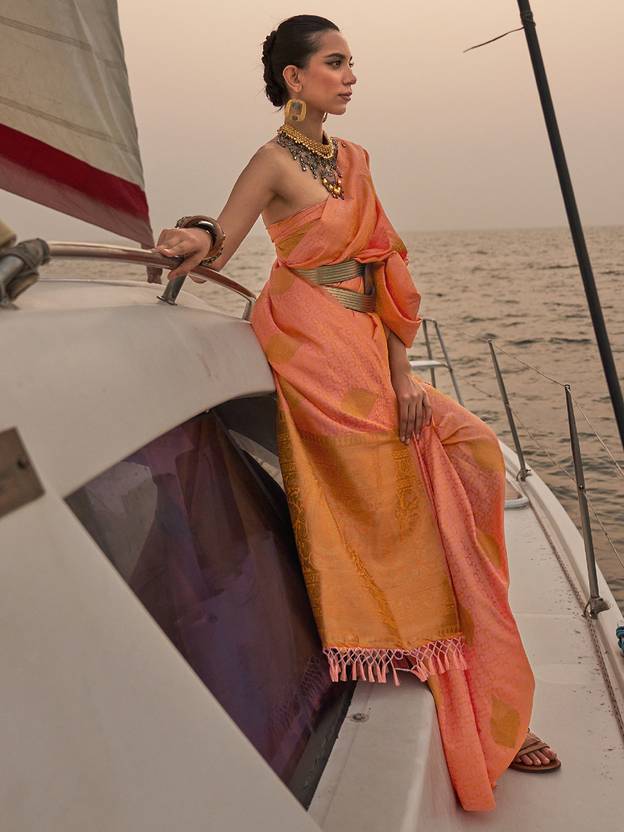 Dusty Orange Graceful Silk Blend Kanjivaram Saree with Tassel Detailing ClothsVilla Main image