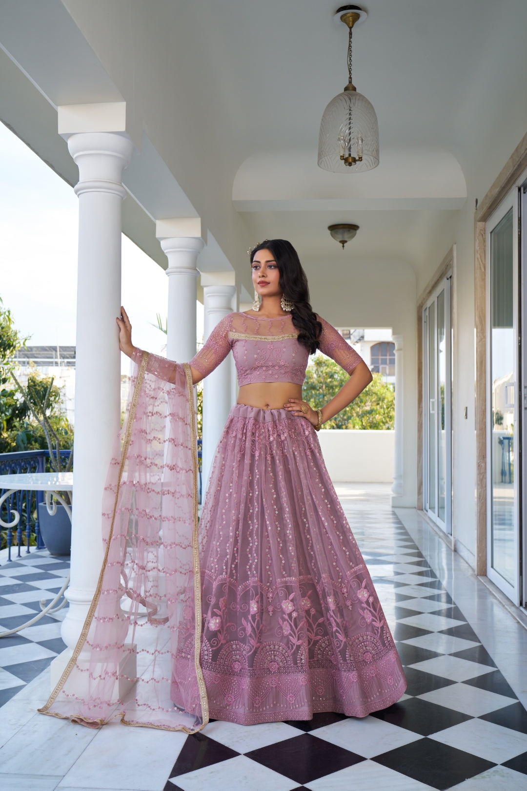 Dusty Pink Elegant Butterfly Net Lehenga with Intricate Embroidery Main image