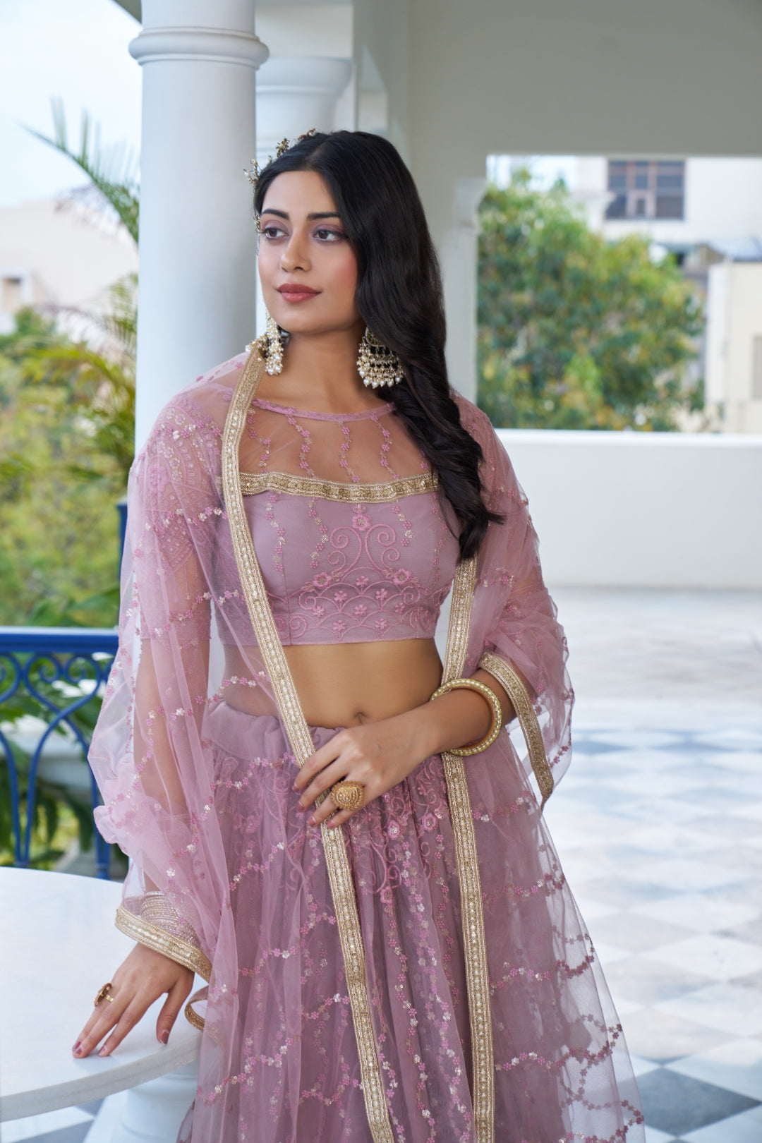 Dusty Pink Elegant Butterfly Net Lehenga with Intricate Embroidery