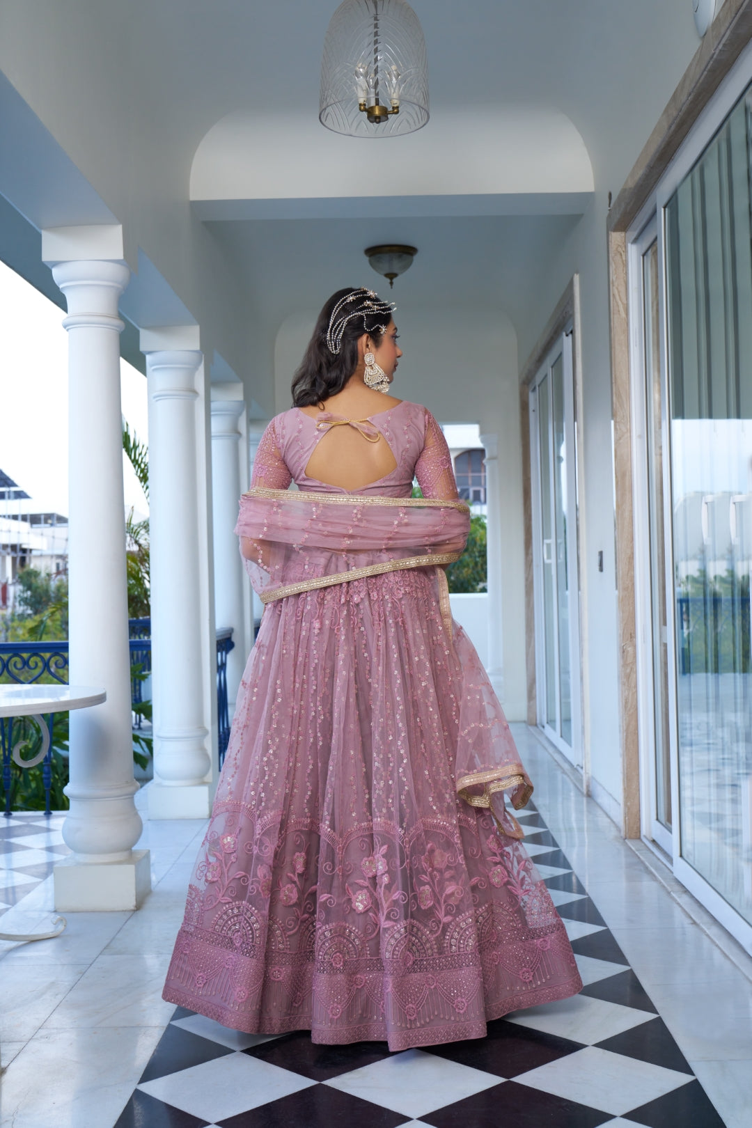 Dusty Pink Elegant Butterfly Net Lehenga with Intricate Embroidery