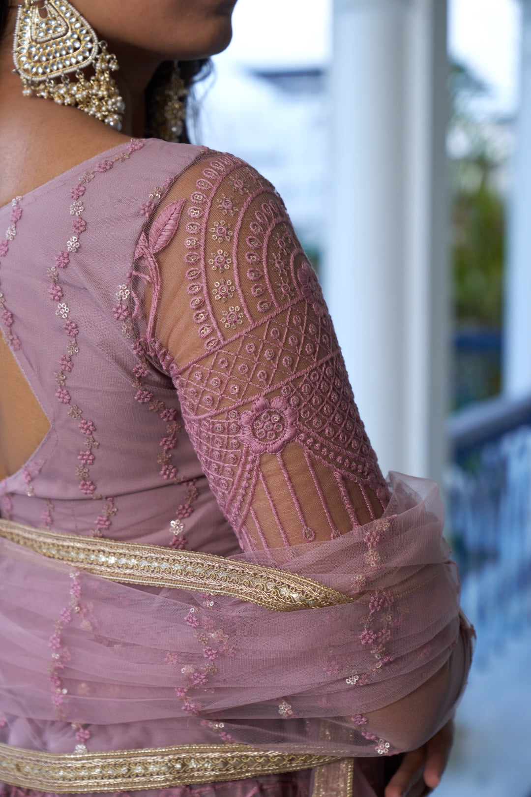 Dusty Pink Elegant Butterfly Net Lehenga with Intricate Embroidery