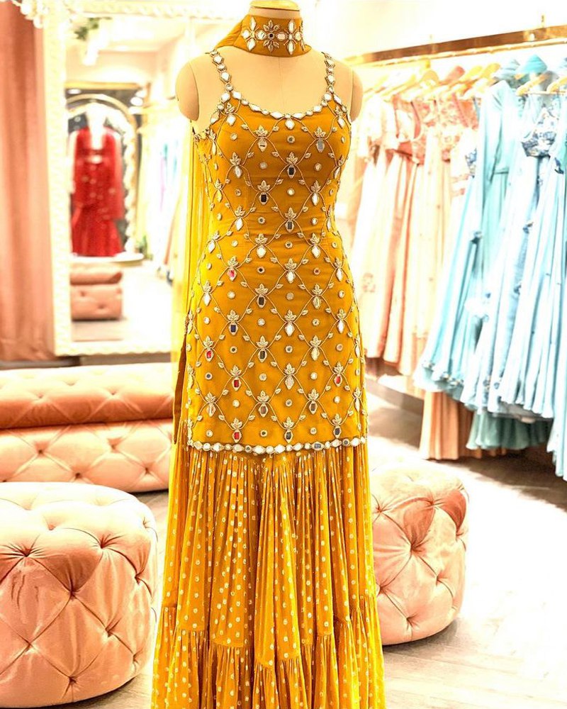 sharara dress Sanya Gulati - Mauve Peplum and Set pair with polki for a day wedding and colorful jewellery with a high pony for a fun mehendi look! Elegant Georgette Musterd Sharara Suit