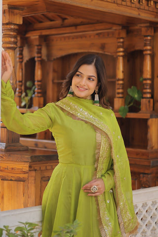 Enchanting Parrot Green Russian Silk Gown-Dupatta Set with Exquisite Sequined Embroidery and Lace Border ClothsVilla