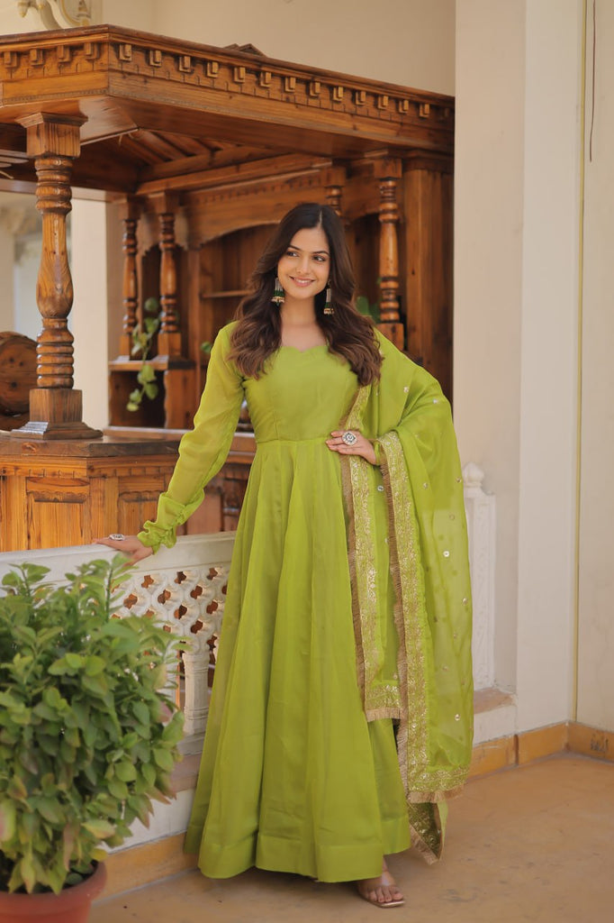Enchanting Parrot Green Russian Silk Gown-Dupatta Set with Exquisite Sequined Embroidery and Lace Border ClothsVilla