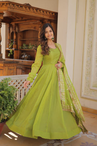Enchanting Parrot Green Russian Silk Gown-Dupatta Set with Exquisite Sequined Embroidery and Lace Border ClothsVilla
