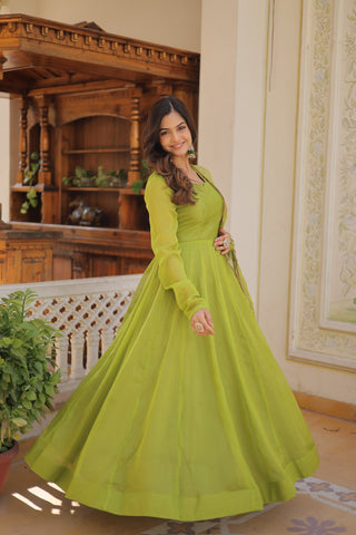 Enchanting Parrot Green Russian Silk Gown-Dupatta Set with Exquisite Sequined Embroidery and Lace Border ClothsVilla