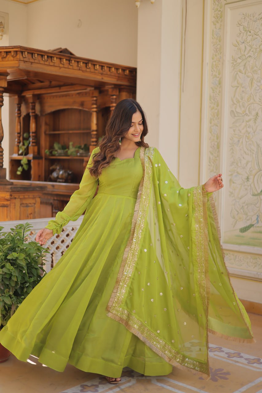 Enchanting Parrot Green Russian Silk Gown-Dupatta Set with Exquisite Sequined Embroidery and Lace Border ClothsVilla