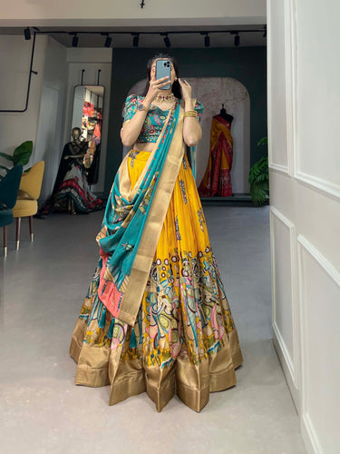 Enchanting Yellow Dola Silk Lehenga Choli with Kalamkari Print ClothsVilla