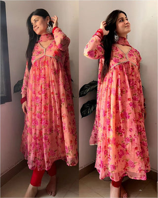 Exquisite Peach Floral Nayra Cut Kurti with Fancy Puff Sleeves & Flared Silhouette ClothsVilla