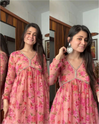 Exquisite Peach Floral Nayra Cut Kurti with Fancy Puff Sleeves & Flared Silhouette ClothsVilla