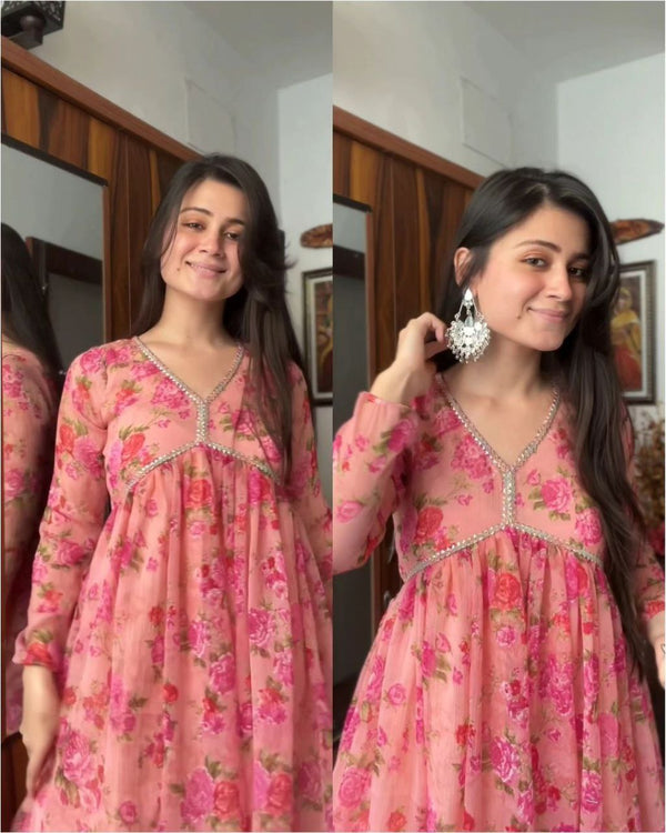 Exquisite Peach Floral Nayra Cut Kurti with Fancy Puff Sleeves & Flared Silhouette ClothsVilla