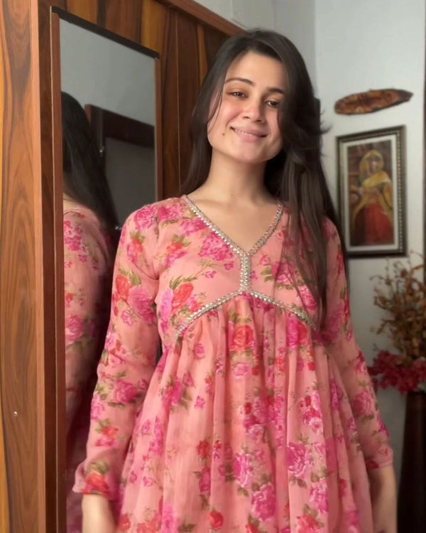 Exquisite Peach Floral Nayra Cut Kurti with Fancy Puff Sleeves & Flared Silhouette ClothsVilla