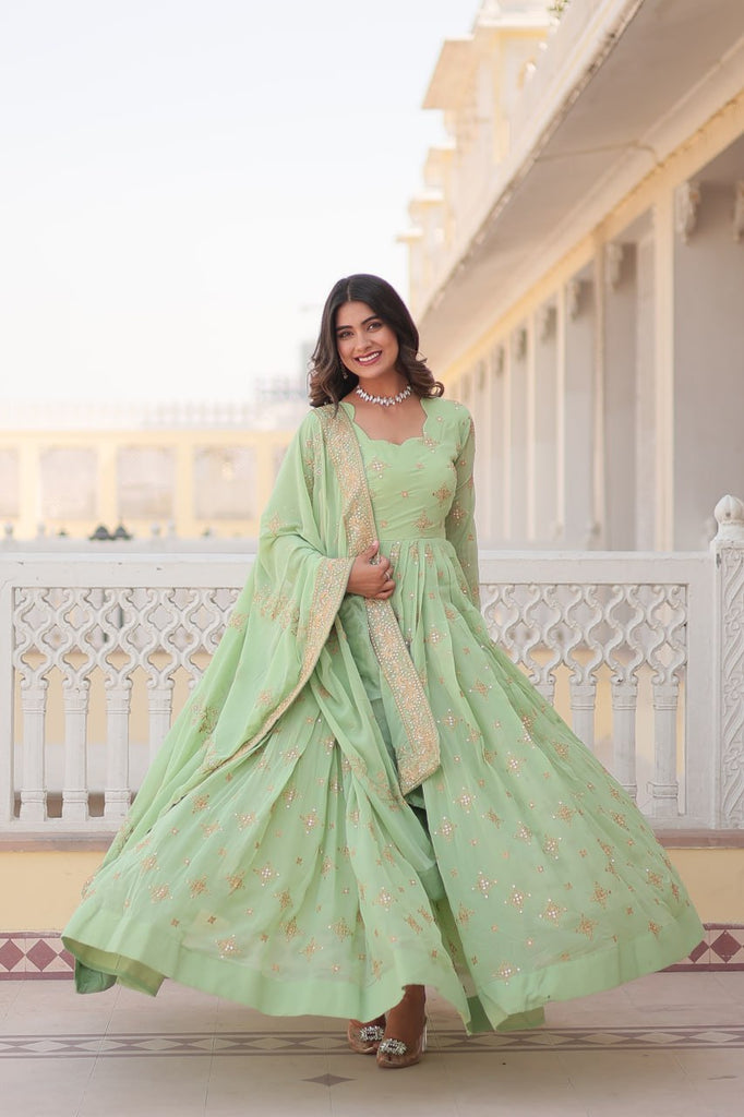 Faux Georgette Pista Green Gown with Zari & Sequin Embro Faux Georgette Pista Green Gown with Zari & Sequin Embro