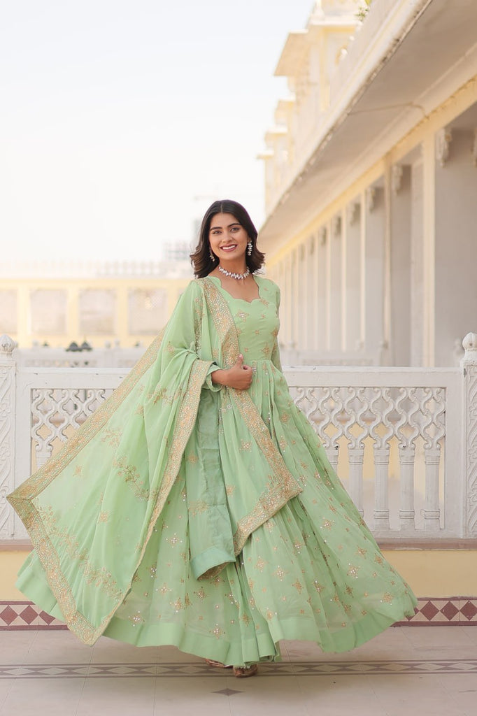 Faux Georgette Pista Green Gown with Zari & Sequin Embro Faux Georgette Pista Green Gown with Zari & Sequin Embro