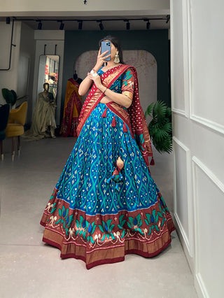 Firozi Blue Color Exuberant Dola Silk Lehenga Set with Stunning Foil Prints ClothsVilla
