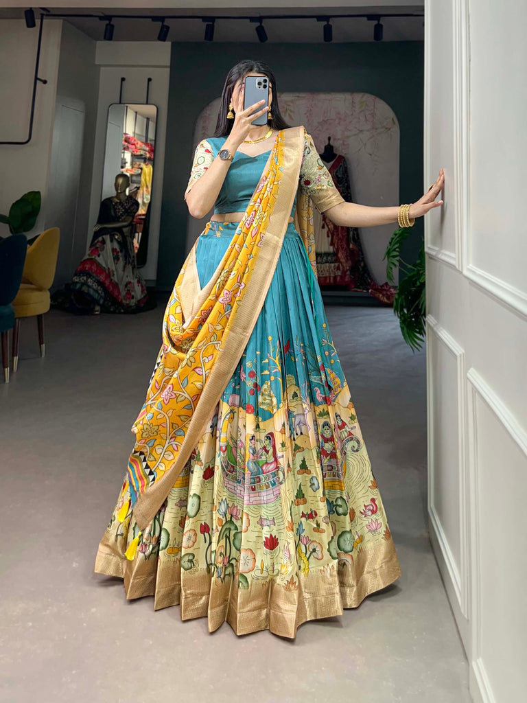 Alluring Firozi Dola Silk Lehenga Choli with Enchanting Kalamkari Prints ClothsVilla