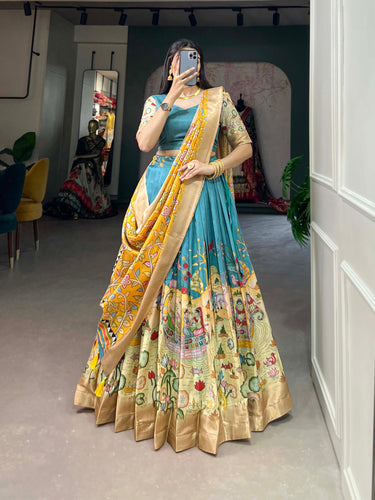 Alluring Firozi Dola Silk Lehenga Choli with Enchanting Kalamkari Prints ClothsVilla