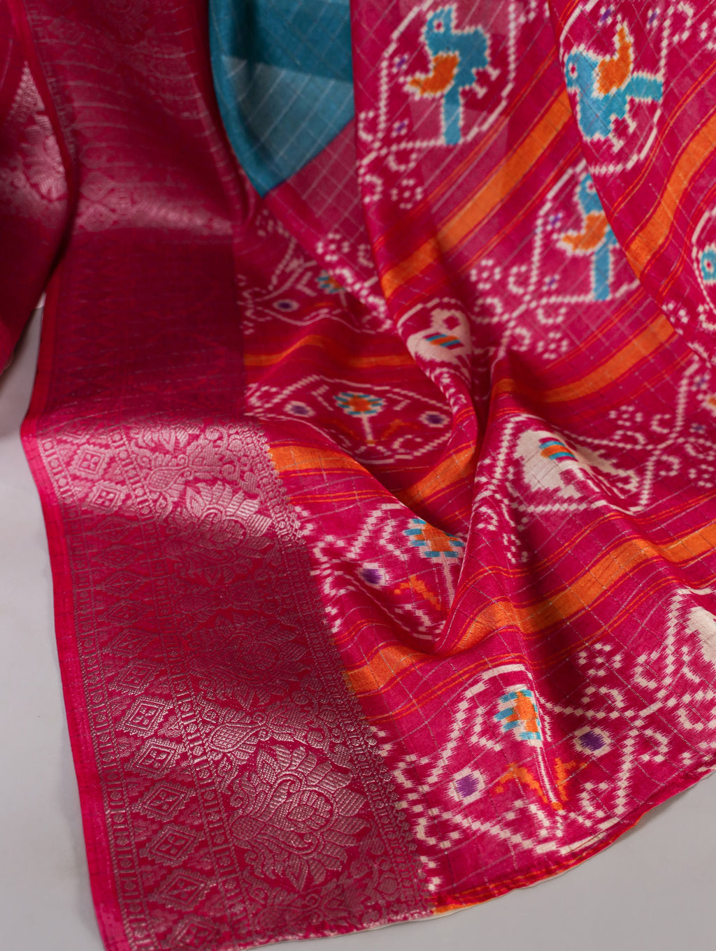 Firozi Tussar Chex Saree with Patola Print and Weaving Work Border