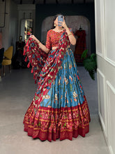 Load image into Gallery viewer, Firozi Tussar Silk Lehenga Choli with Pichwai &amp; Patola Prints ClothsVilla