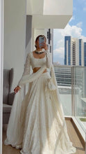 Load image into Gallery viewer, Glimmering White Designer Lehenga Sequenced Elegance for your Wedding Day ClothsVilla
