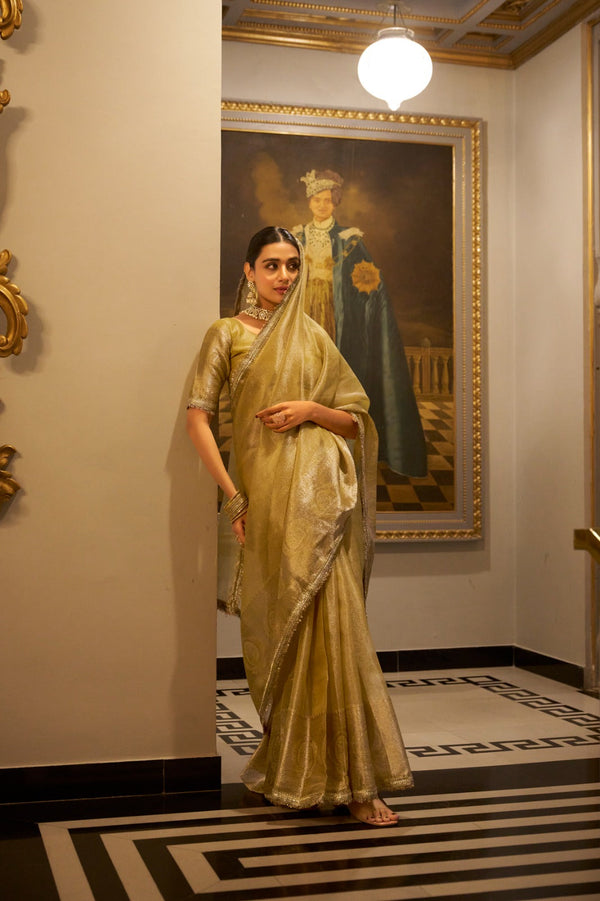 Gold Elegant Tissue Shimmer Saree with Zari Weaving and Sequins Lace Border ClothsVilla