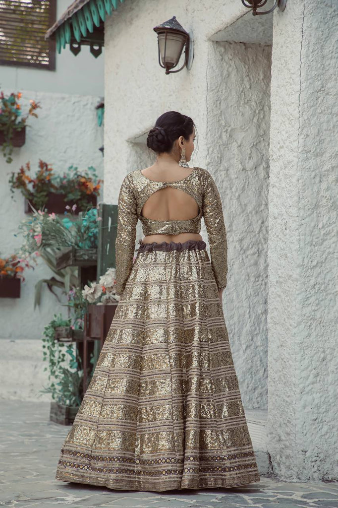 Gold Shimmering Faux Georgette Sequins Lehenga Set with Can-Can ClothsVilla